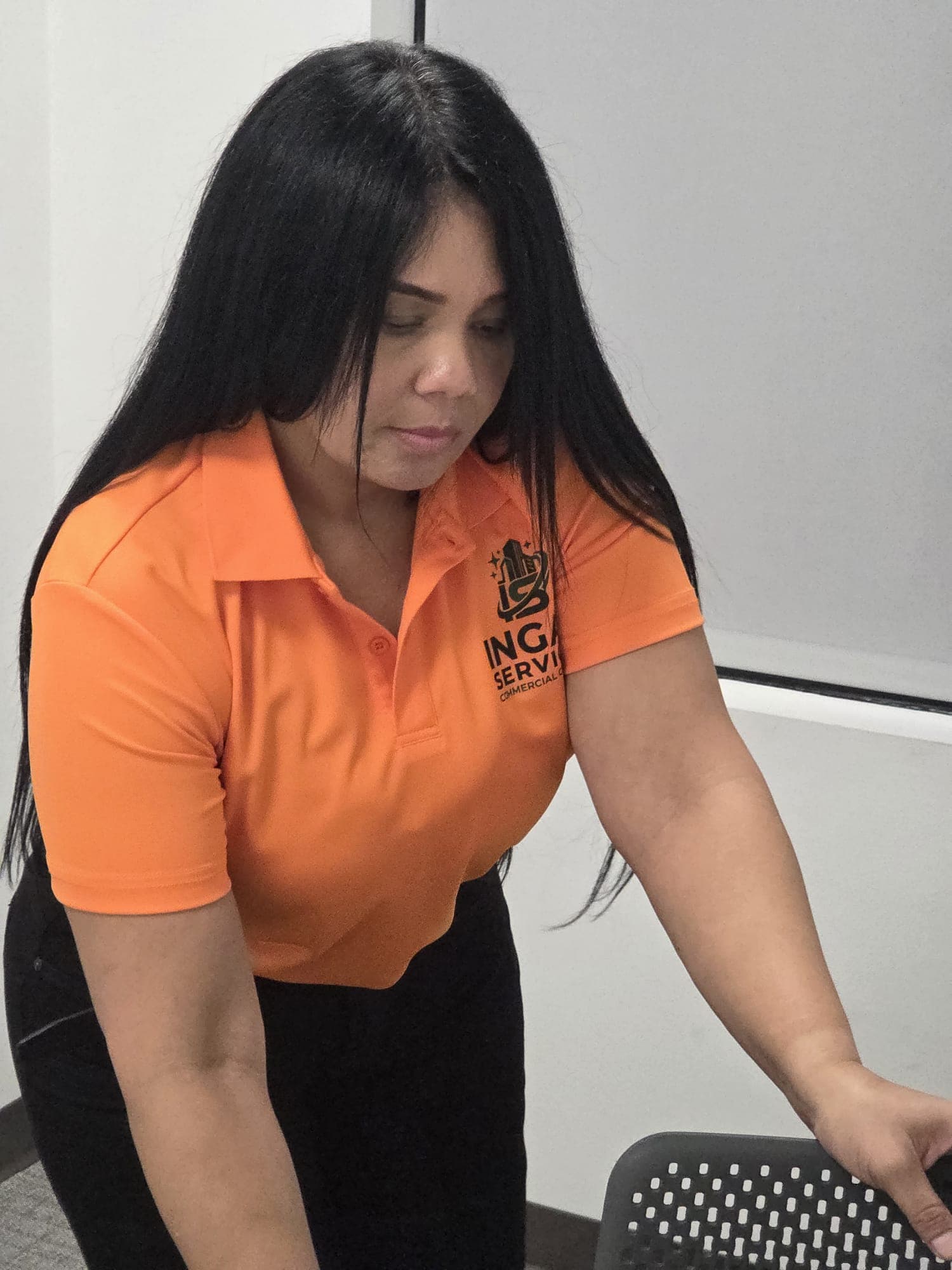 INGAL SERVICES INC employee wiping down office seating and chairs